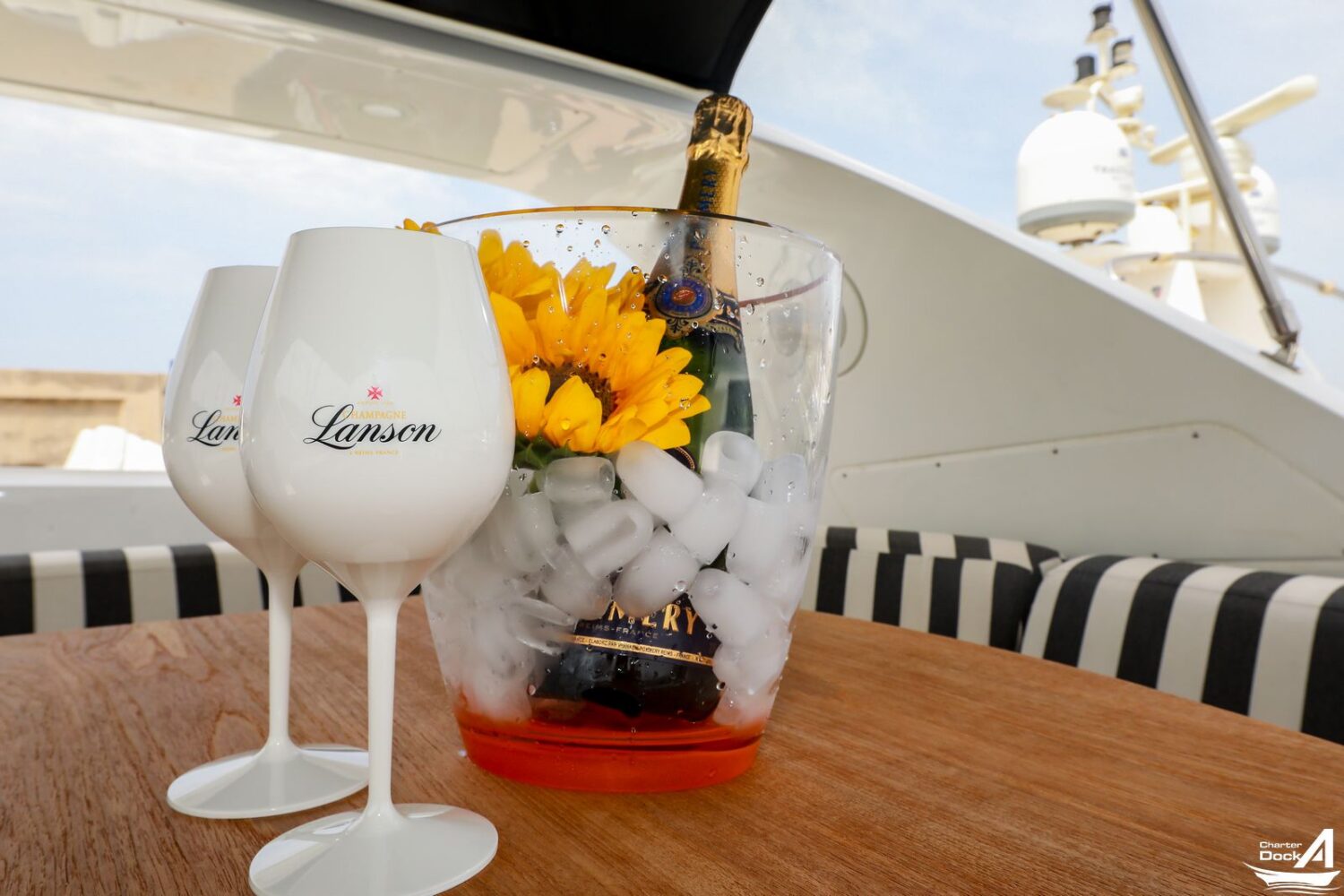 Champagne on a Luxurious super yacht anchored in the azure waters of Naples Italy